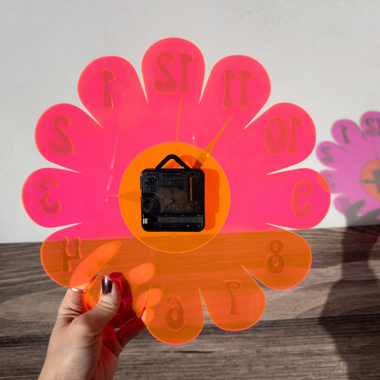 Blacklight Daisy Wall Clock